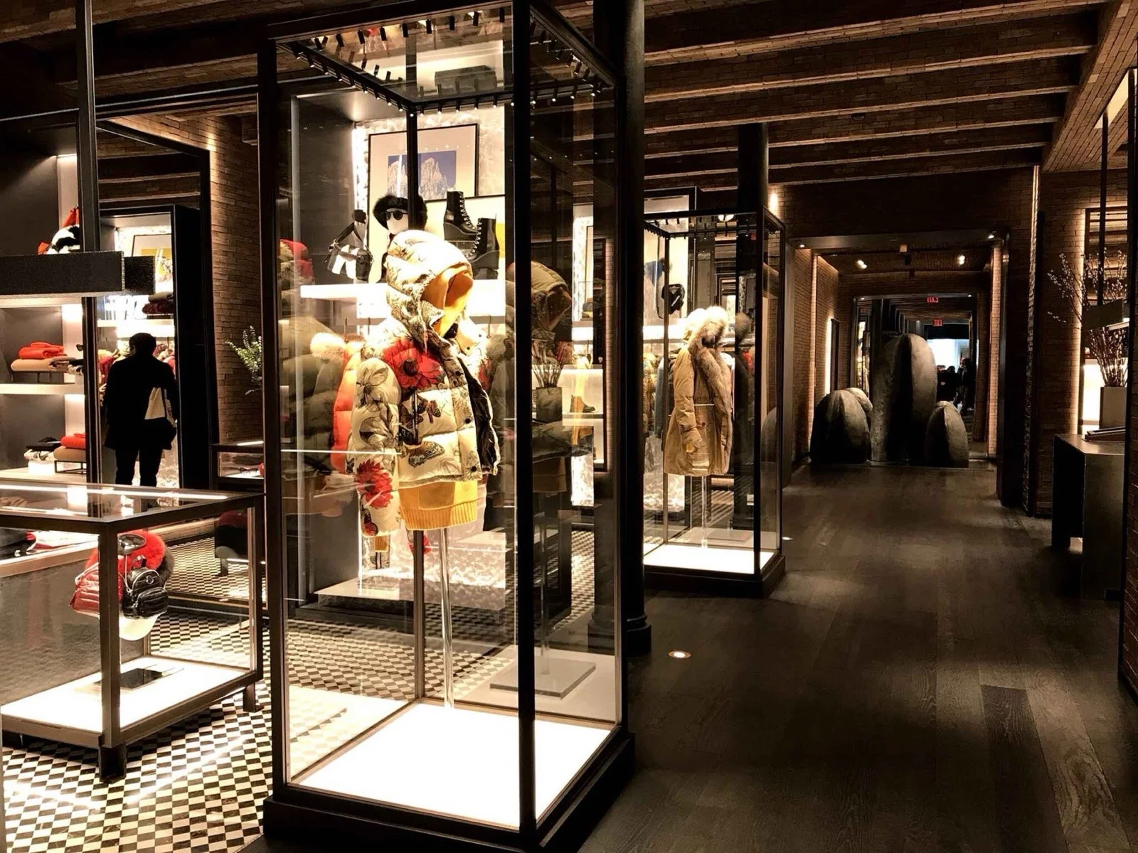 Moncler Soho flagship store interior with glass display cases